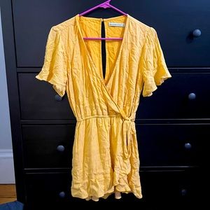Cute Abercrombie yellow romper with front wrap skirt in XS